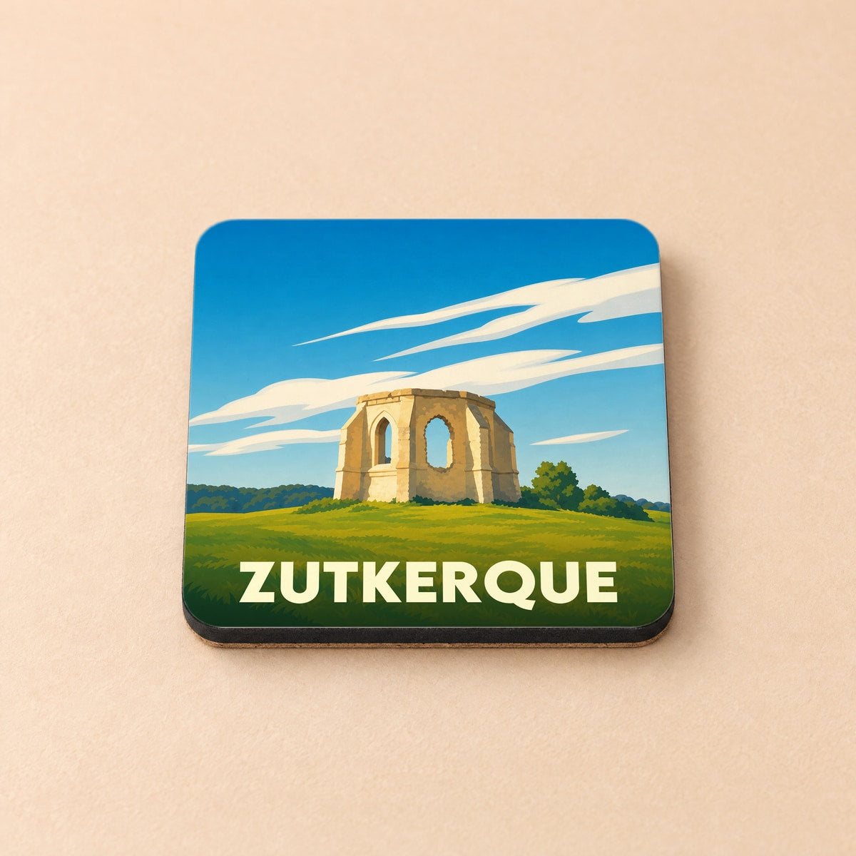 Dessous de verre souvenir de la ville de Zutkerque avec une illustration stylisée de ruines historiques.