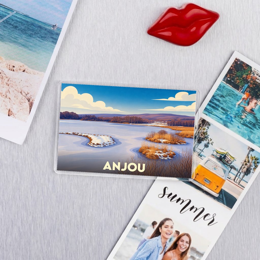 Magnet souvenir de la ville d'Anjou avec une illustration stylisée d'un paysage naturel.
