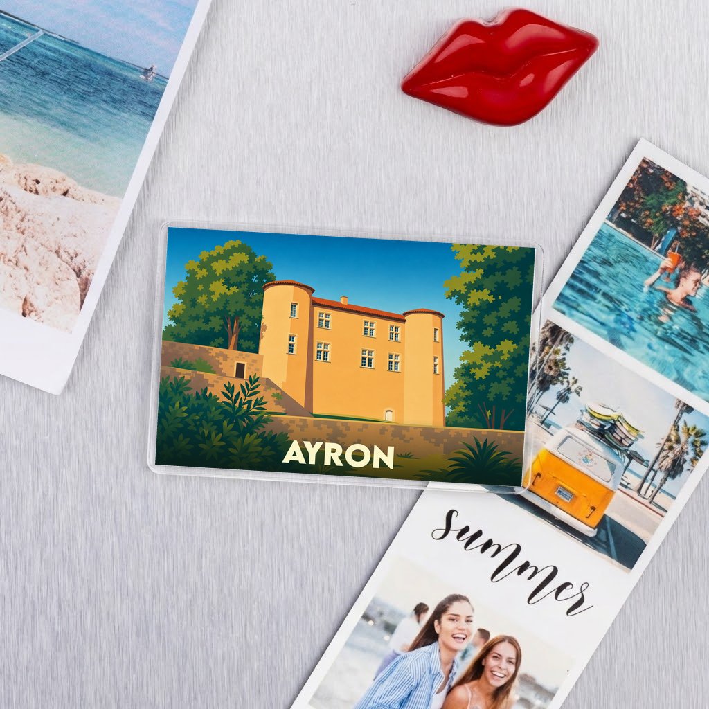 Magnet souvenir de la ville d'Ayron avec une illustration stylisée du château local.