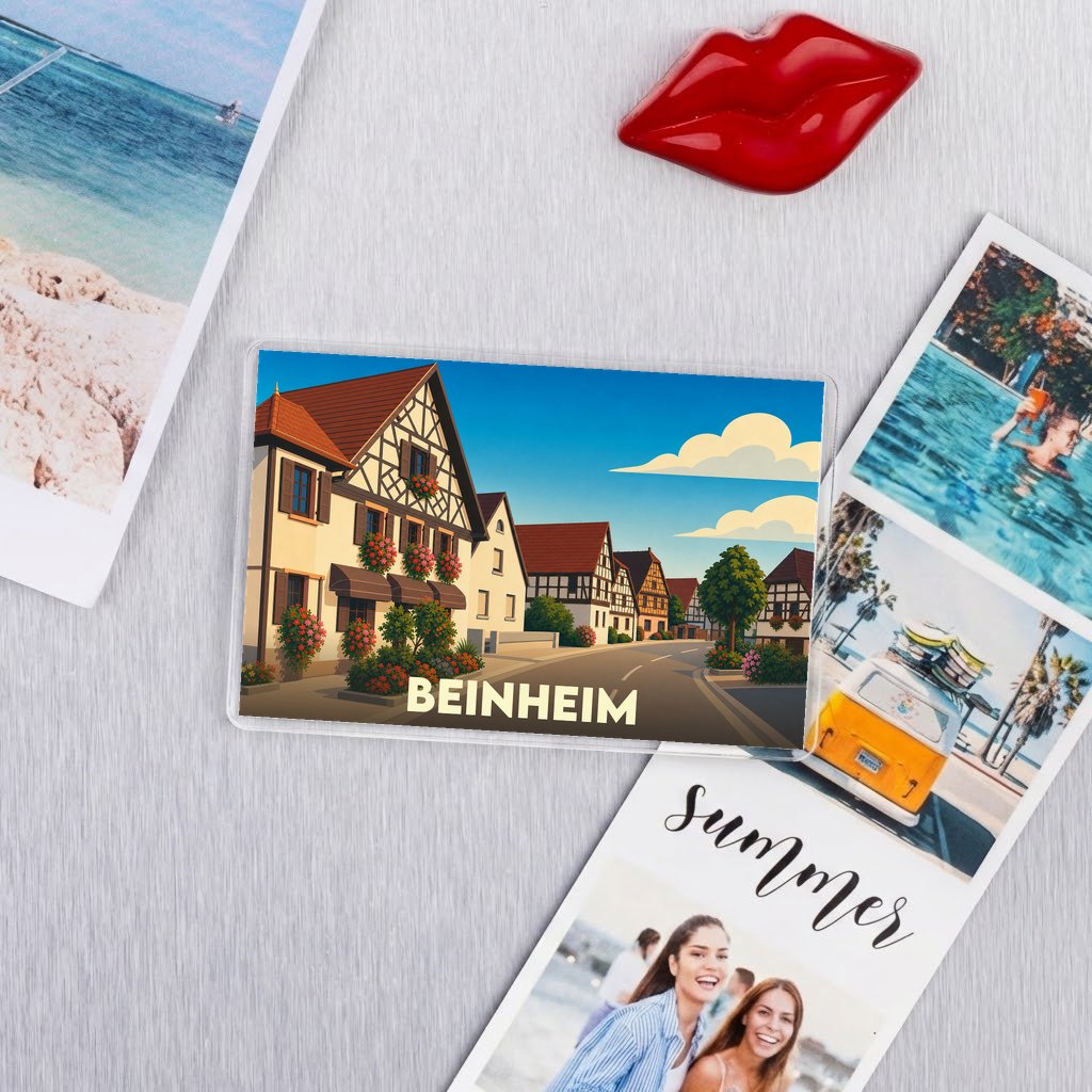 Magnet souvenir de la ville de Beinheim avec une illustration stylisée de maisons à colombages.
