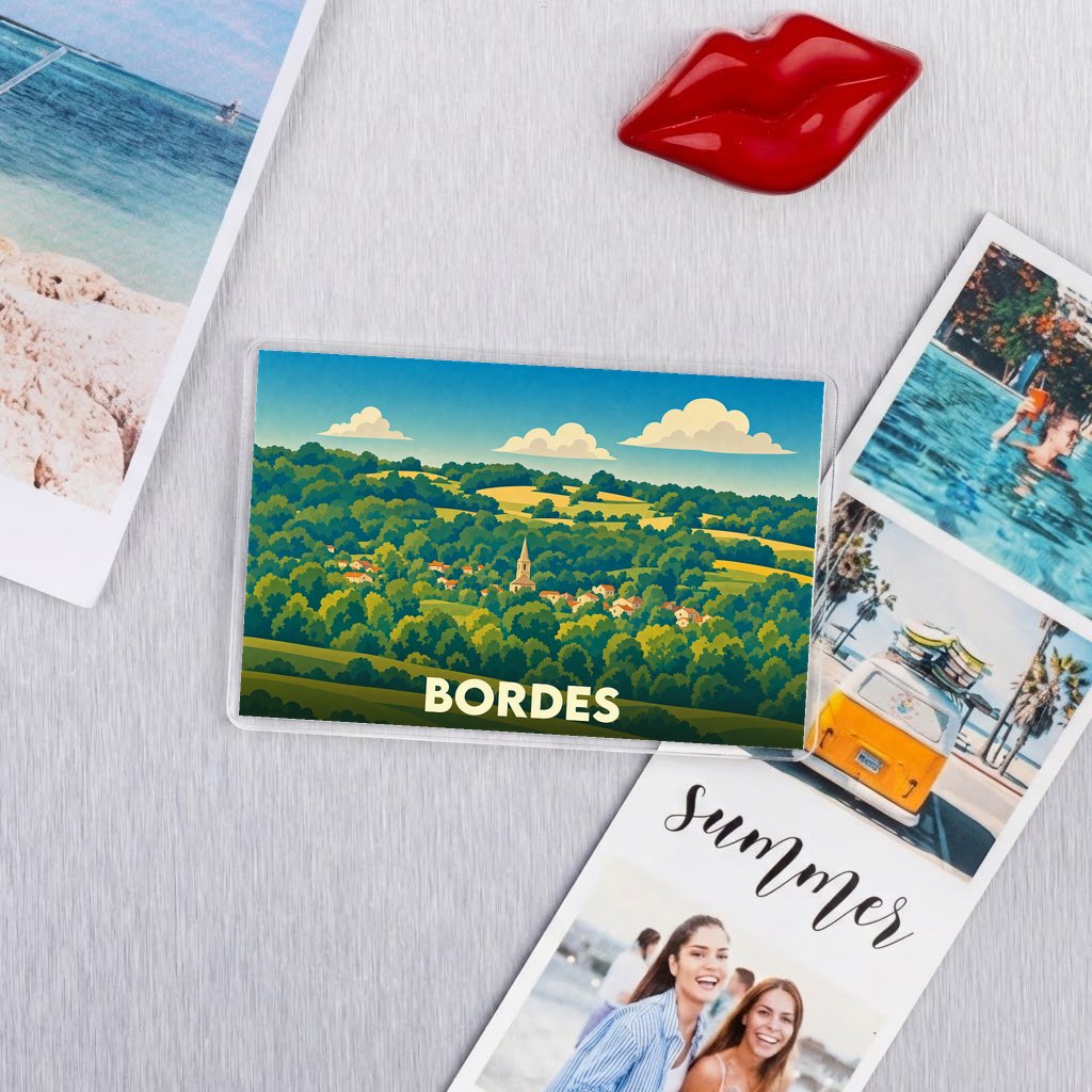 Magnet souvenir de la ville de Bordes avec une illustration stylisée de son paysage vallonné.