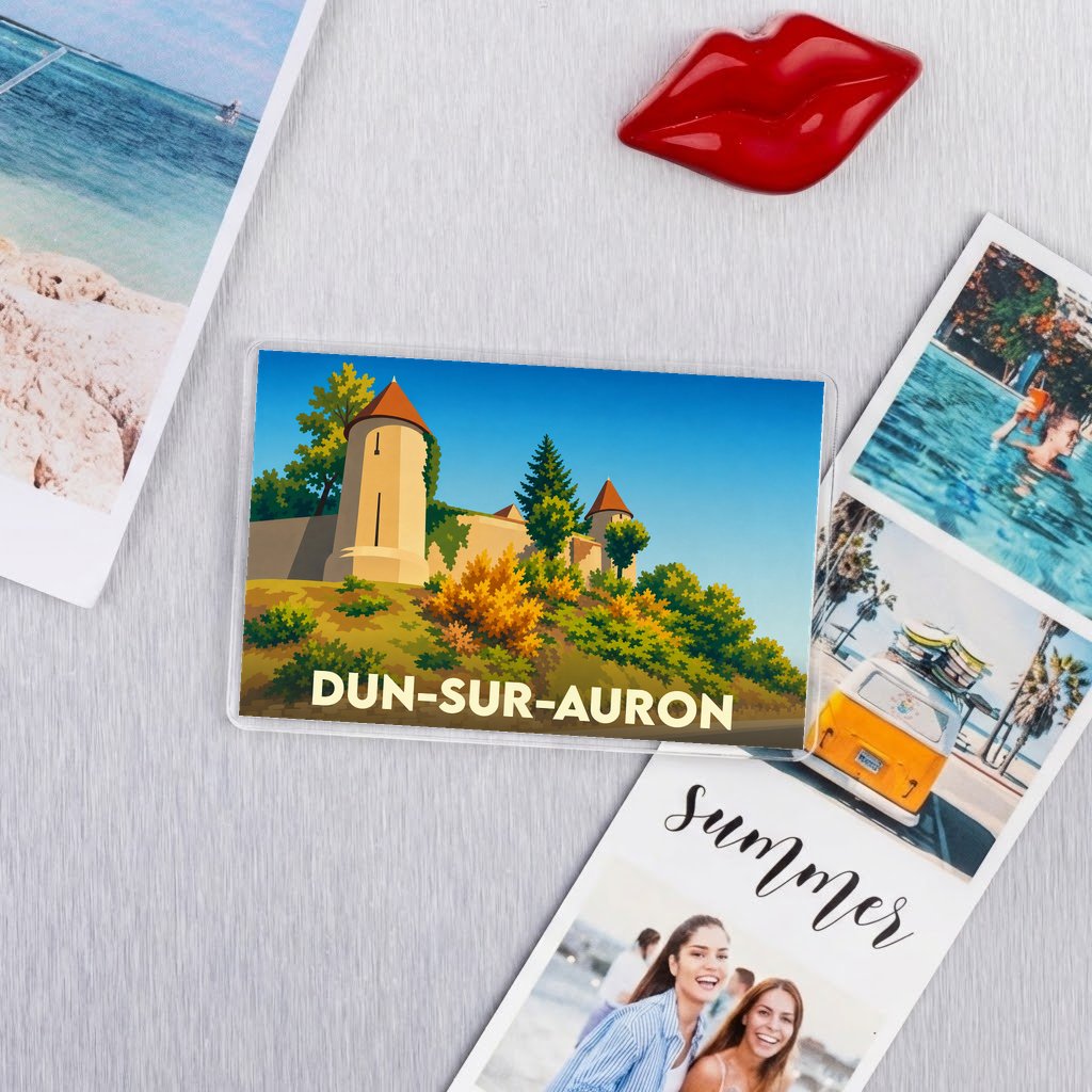 Magnet souvenir de la ville de Dun-sur-Auron avec une illustration stylisée de ses remparts médiévaux.