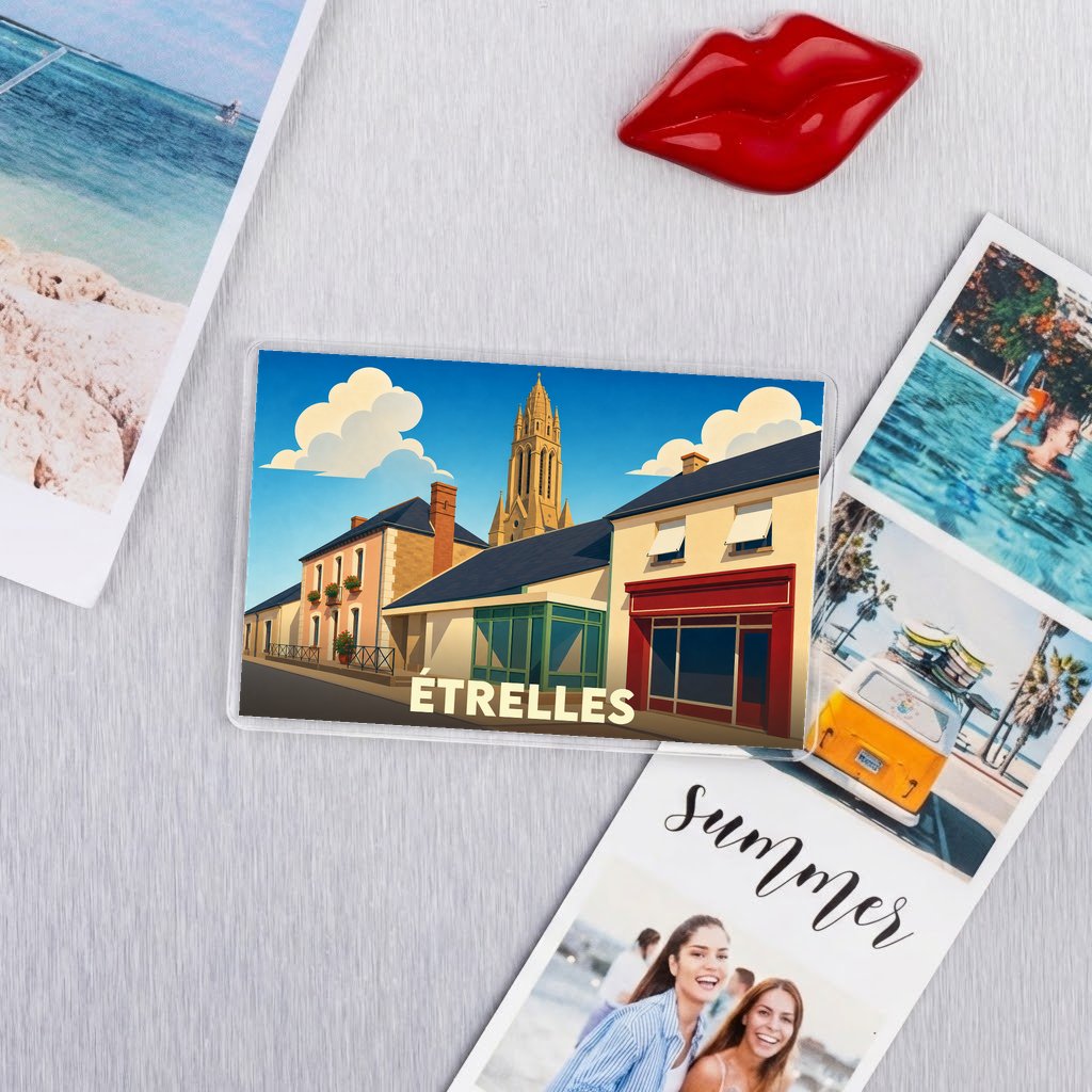 Magnet souvenir de la ville d'Étrelles avec une illustration stylisée de son architecture.