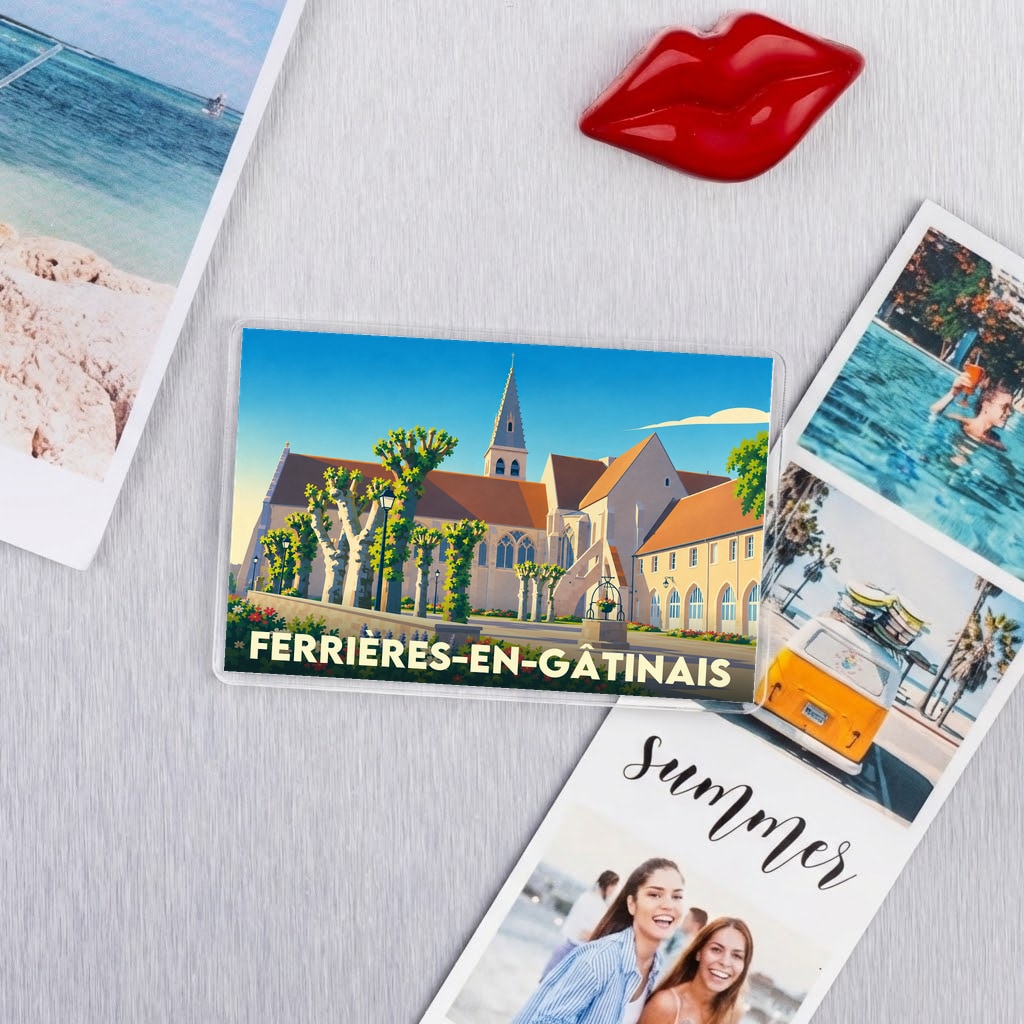 Magnet souvenir de la ville de Ferrières-en-Gâtinais avec une illustration stylisée de son abbaye.