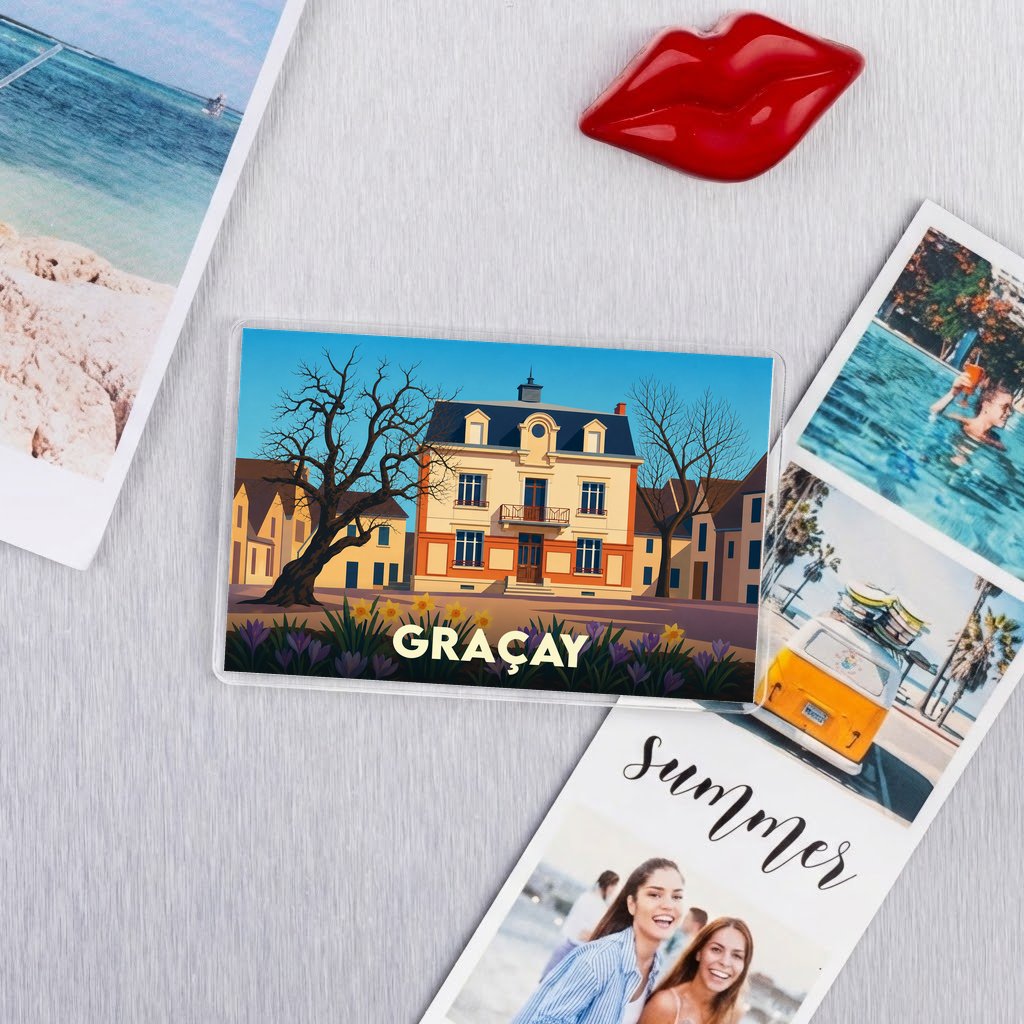 Magnet souvenir de la ville de Graçay avec une illustration stylisée d'un bâtiment historique.