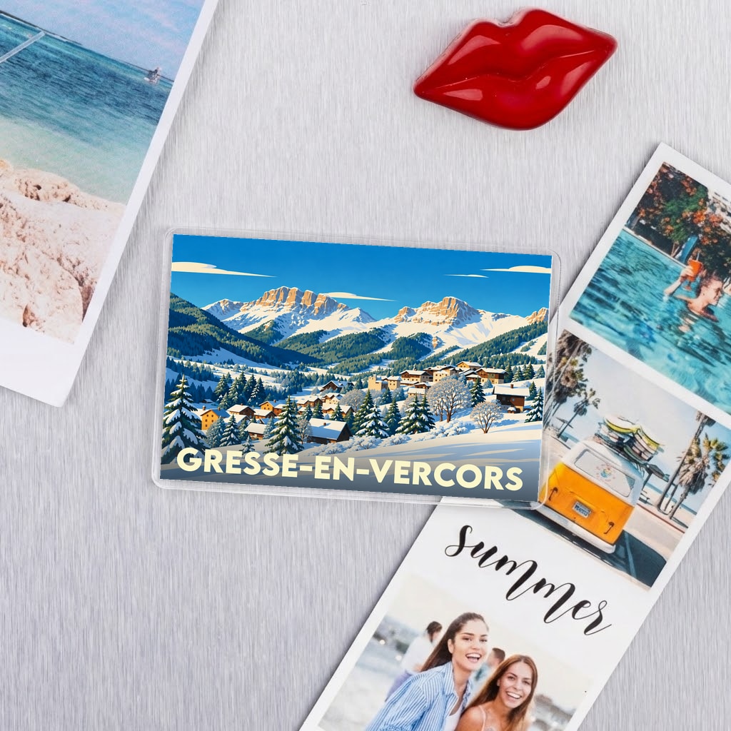 Magnet souvenir de la ville de Gresse-en-Vercors illustrant un paysage de montagne enneigé.