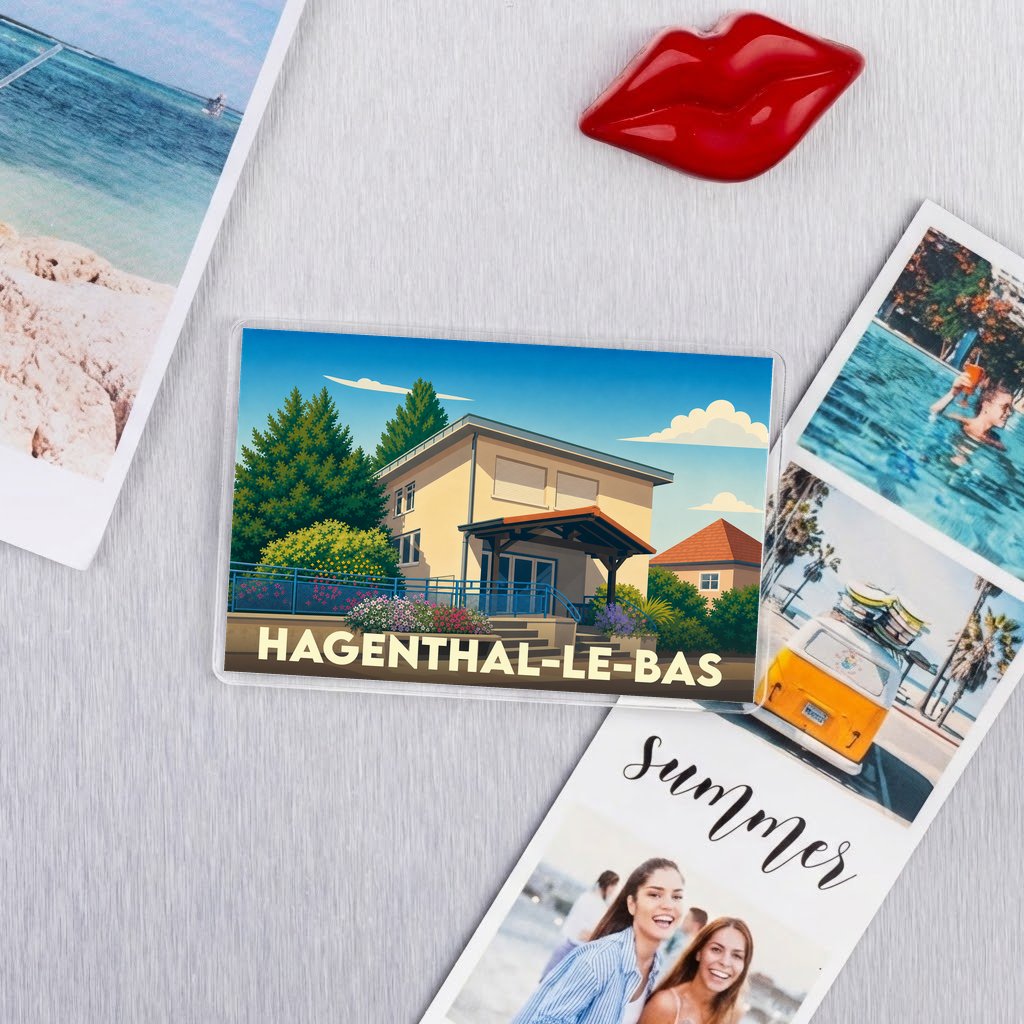Magnet souvenir de la commune de Hagenthal-le-Bas avec une illustration stylisée d'une maison locale.