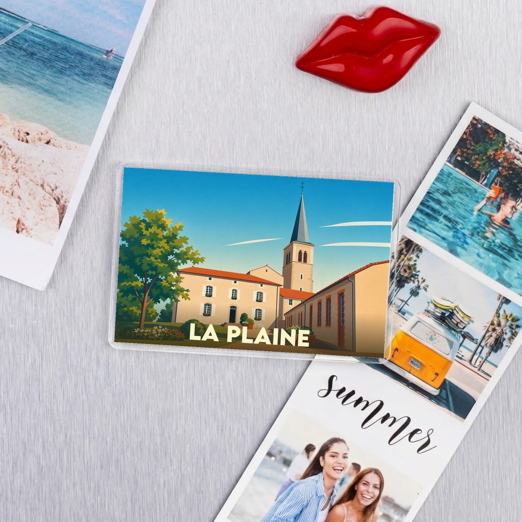 Magnet souvenir de la ville de La Plaine avec une illustration stylisée.