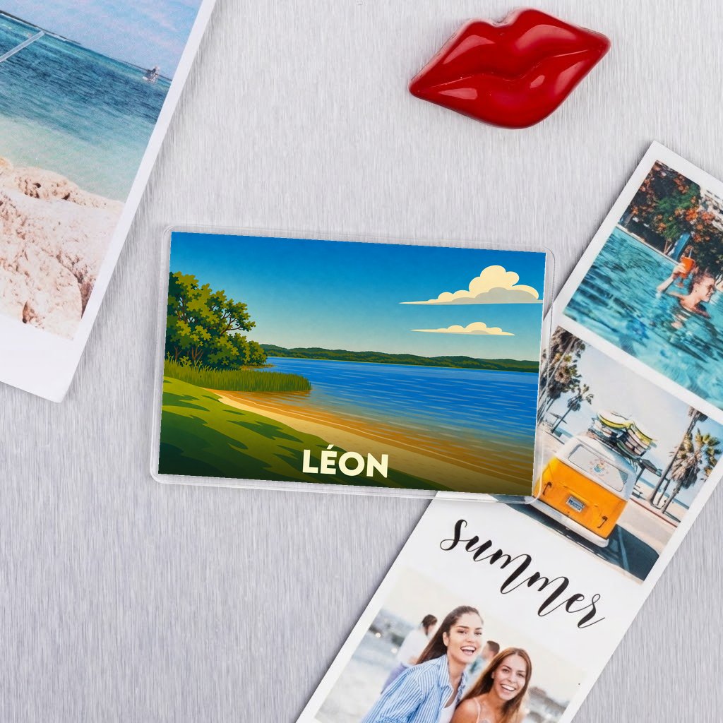 Magnet souvenir de la ville de Léon avec une illustration stylisée d'un lac bordé de verdure.