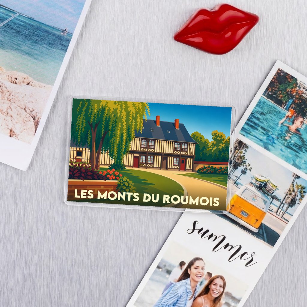 Magnet souvenir de Les Monts du Roumois avec une illustration stylisée d'une maison à colombages.