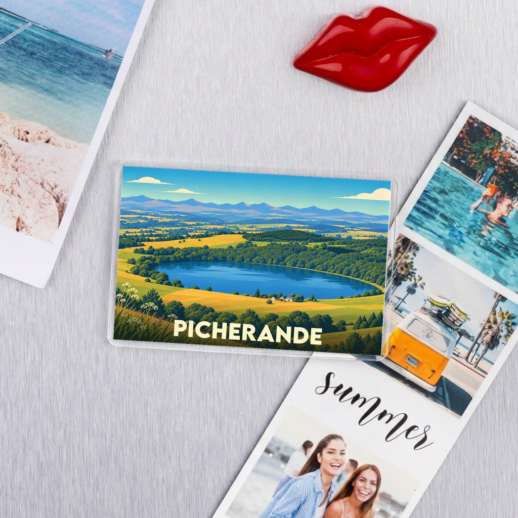 Magnet souvenir de la ville de Picherande avec une illustration stylisée d'un lac de montagne.