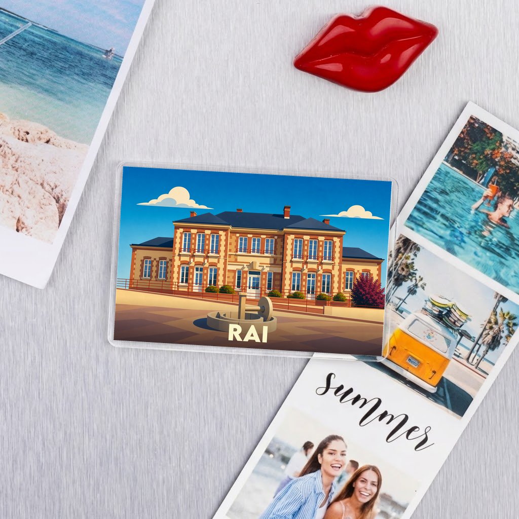 Magnet souvenir de la ville de Rai avec une illustration stylisée d'un bâtiment historique.