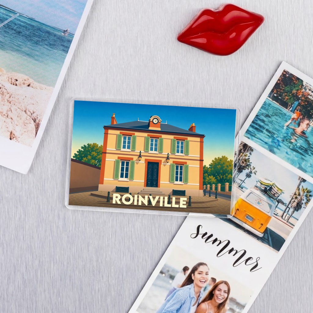 Magnet rectangulaire souvenir de la ville de Roinville avec une illustration stylisée de sa mairie.