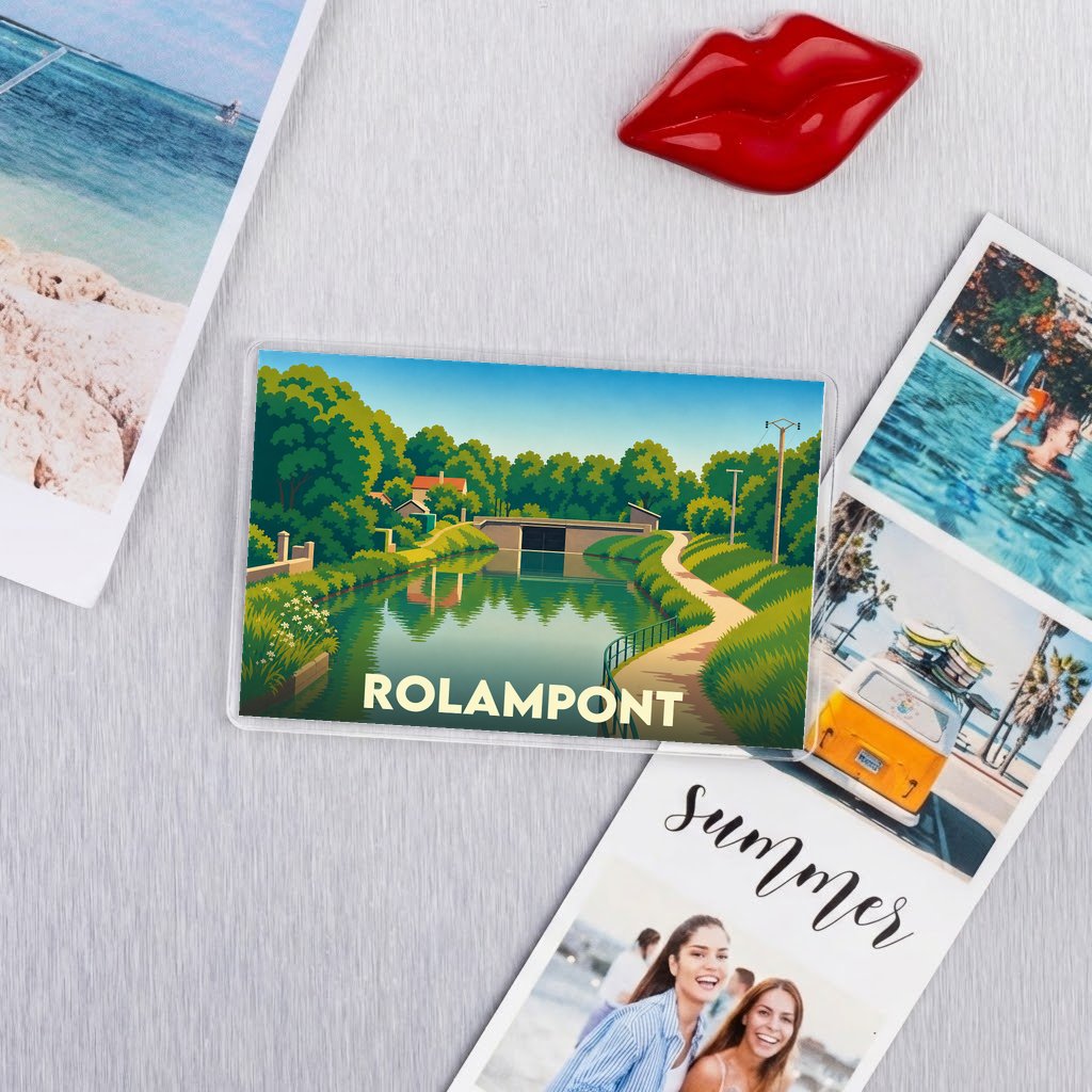 Magnet souvenir de la ville de Rolampont avec une illustration stylisée d'un canal.