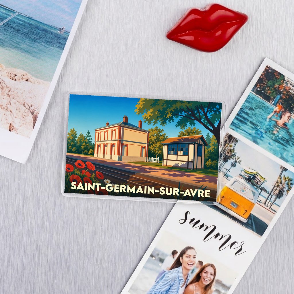 Magnet souvenir de la ville de Saint-Germain-sur-Avre avec une illustration stylisée d'une gare sous un ciel bleu.