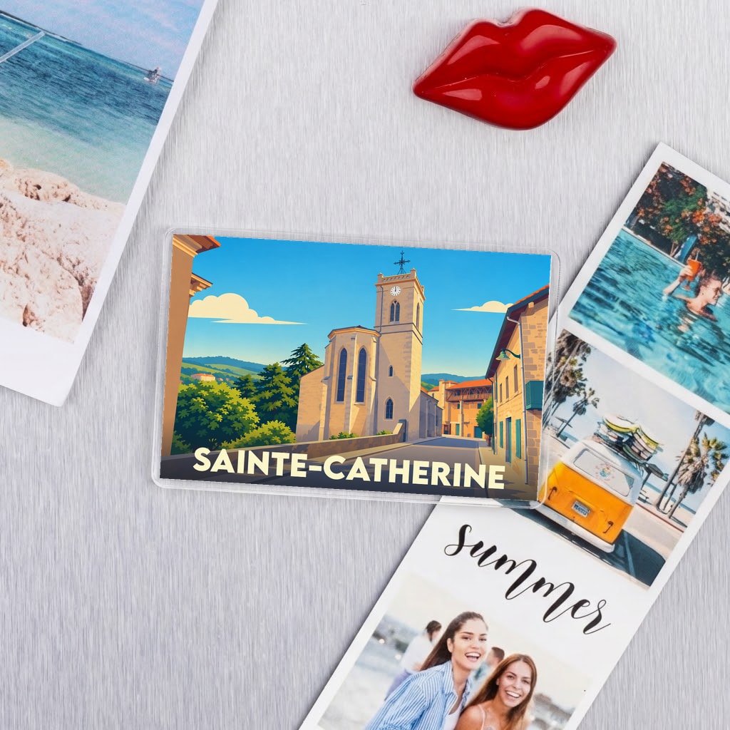 Magnet souvenir de la ville de Sainte-Catherine avec une illustration stylisée de son église et de ses paysages.