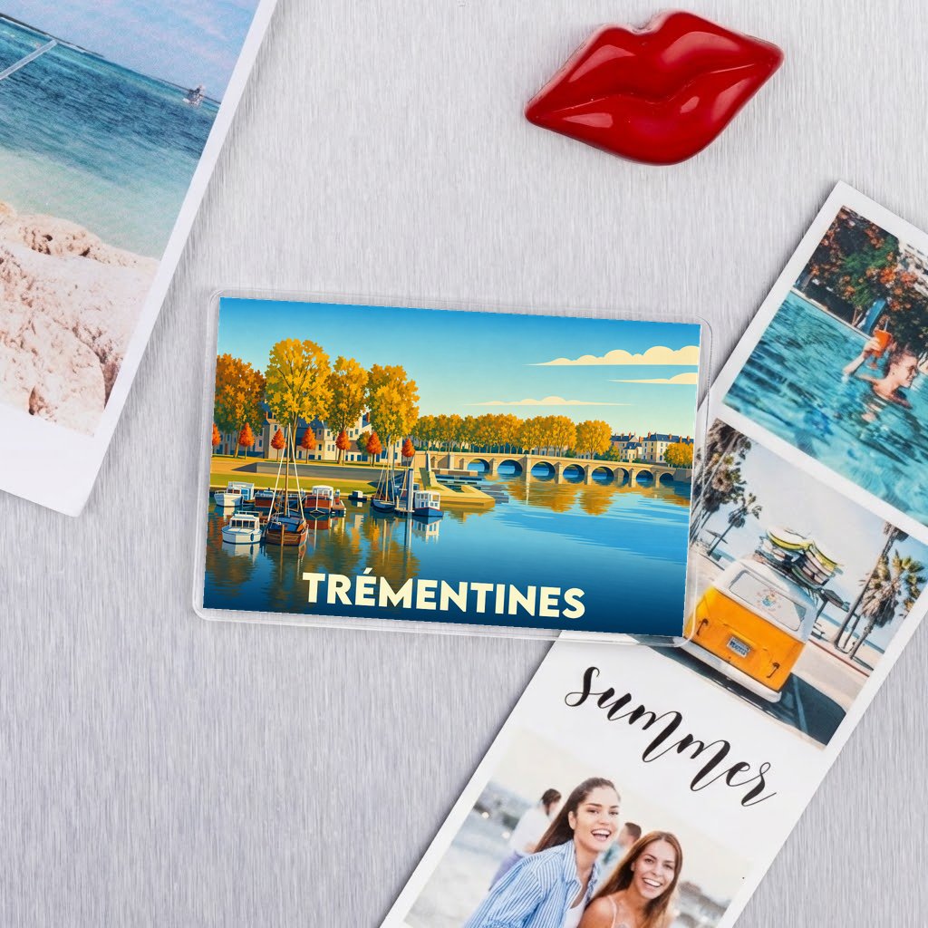 Magnet souvenir de la ville de Trémentines avec une illustration stylisée d'un paysage fluvial automnal.