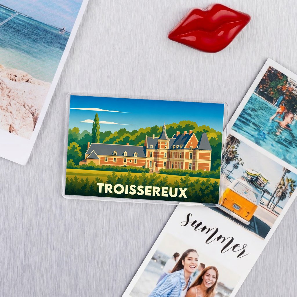 Magnet souvenir de la ville de Troissereux avec une illustration stylisée de son château.