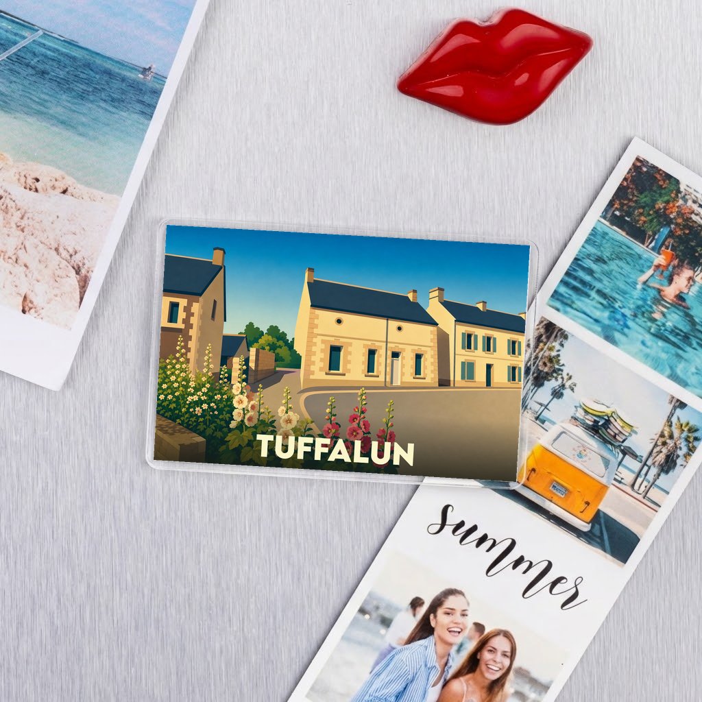 Magnet souvenir de la ville de Tuffalun avec une illustration stylisée.
