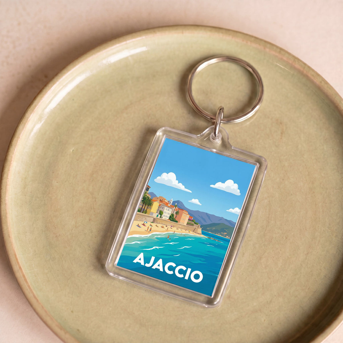 Porte-clés souvenir de la ville d'Ajaccio avec une illustration stylisée.
