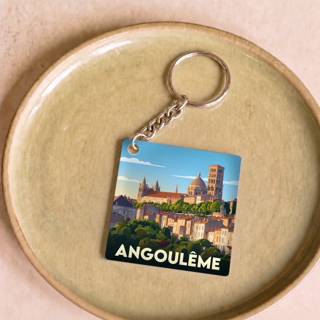 Porte-clés souvenir de la ville d'Angoulême avec une illustration stylisée.