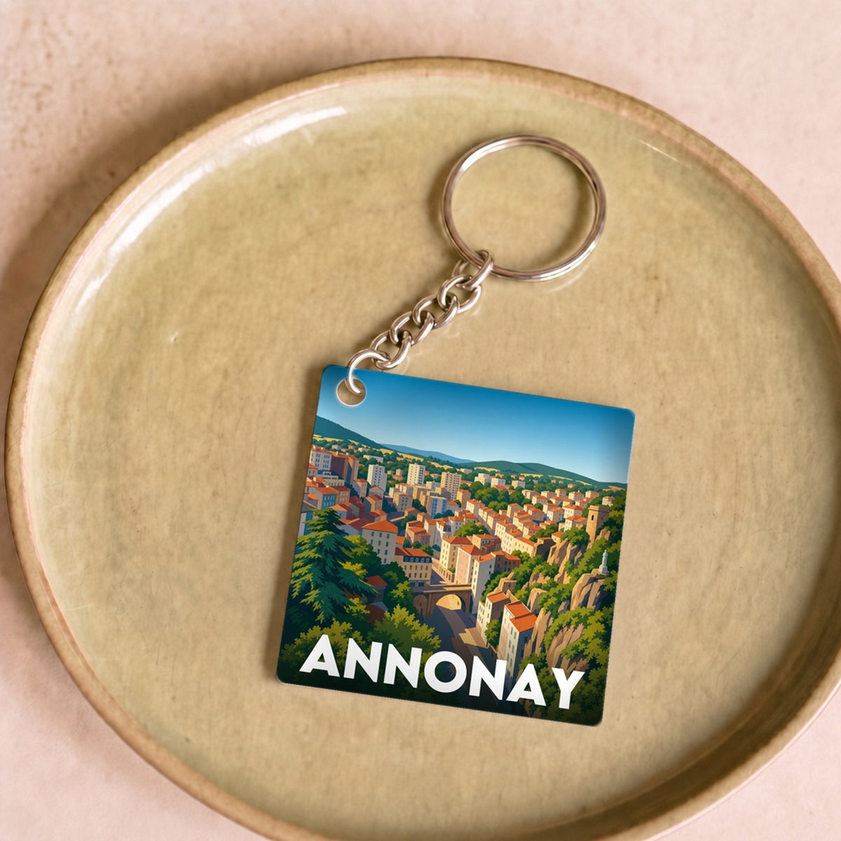 Porte-clés souvenir de la ville d'Annonay avec une illustration stylisée.