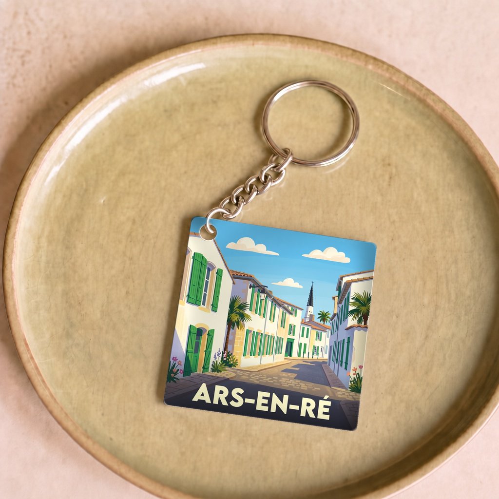 Porte-clés souvenir de la ville d'Ars-en-Ré avec une illustration stylisée.