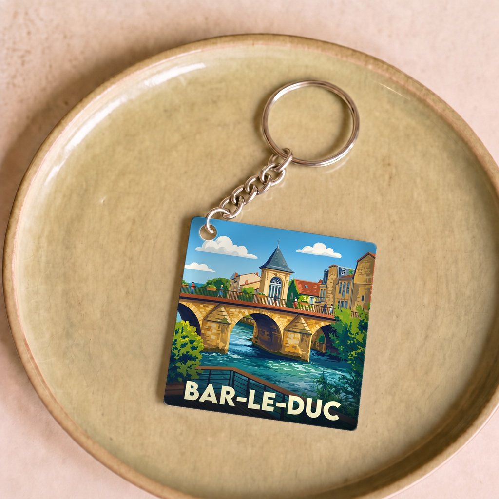 Porte-clés souvenir de la ville de Bar-le-Duc avec une illustration stylisée.