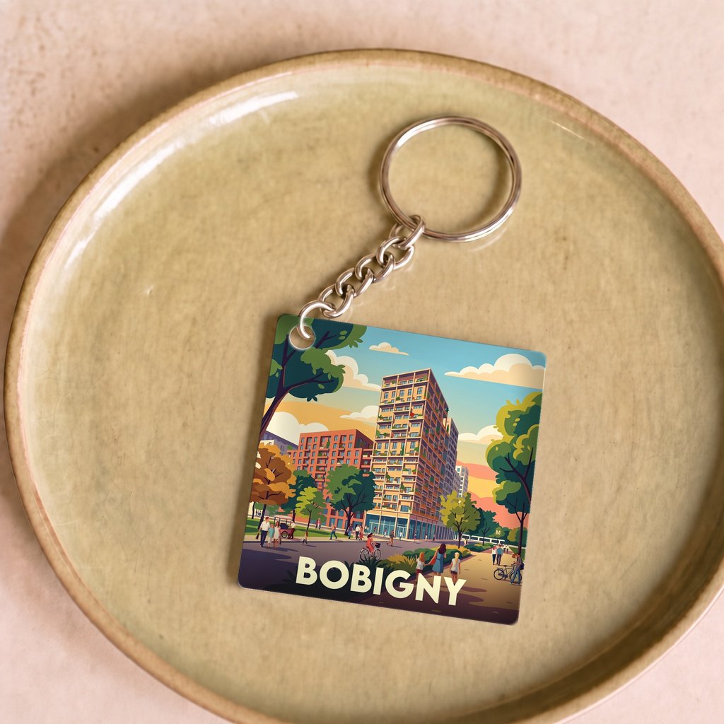 Porte-clés souvenir de la ville de Bobigny avec une illustration stylisée.