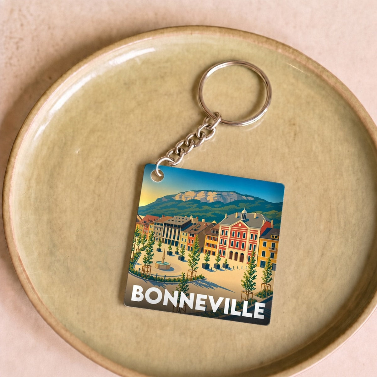 Porte-clés souvenir de la ville de Bonneville avec une illustration stylisée.