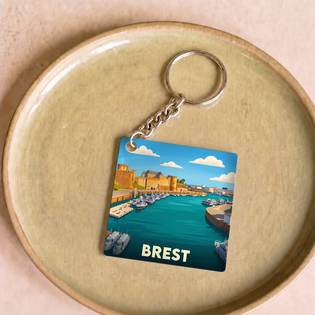 Porte-clés souvenir de la ville de Brest avec une illustration stylisée de son port et de son château.