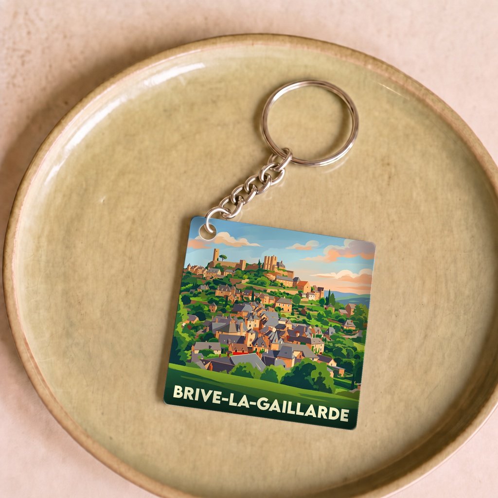 Porte-clés souvenir de la ville de Brive-la-Gaillarde avec une illustration stylisée.