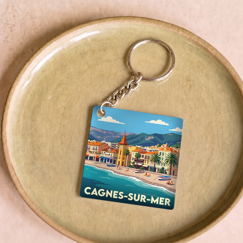 Porte-clés souvenir de la ville de Cagnes-sur-Mer avec une illustration stylisée.