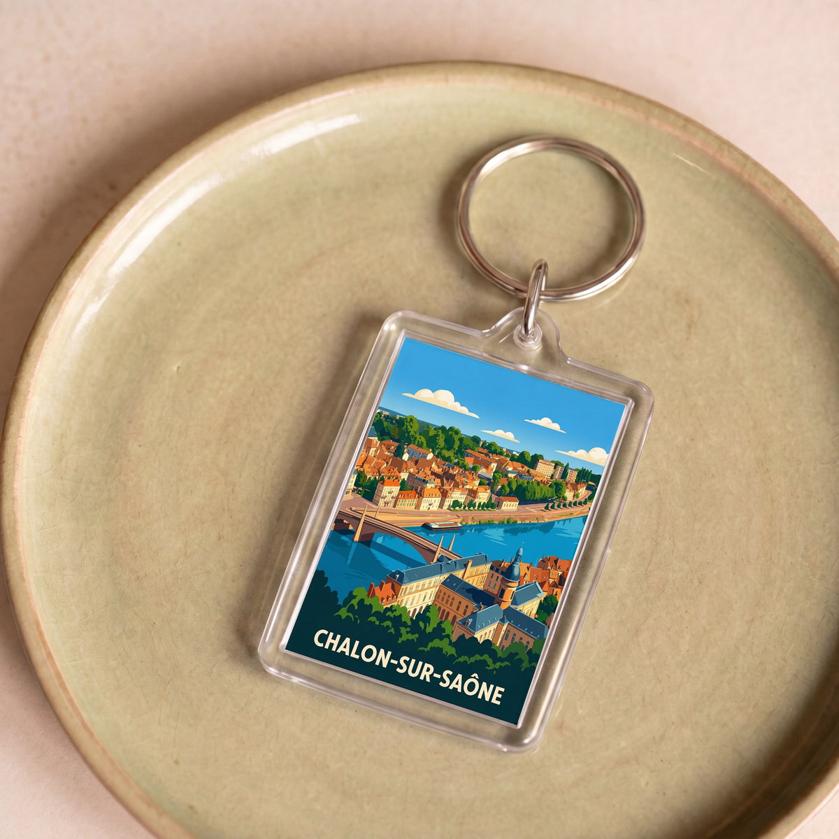 Porte-clés souvenir de la ville de Chalon-sur-Saône avec une illustration stylisée.