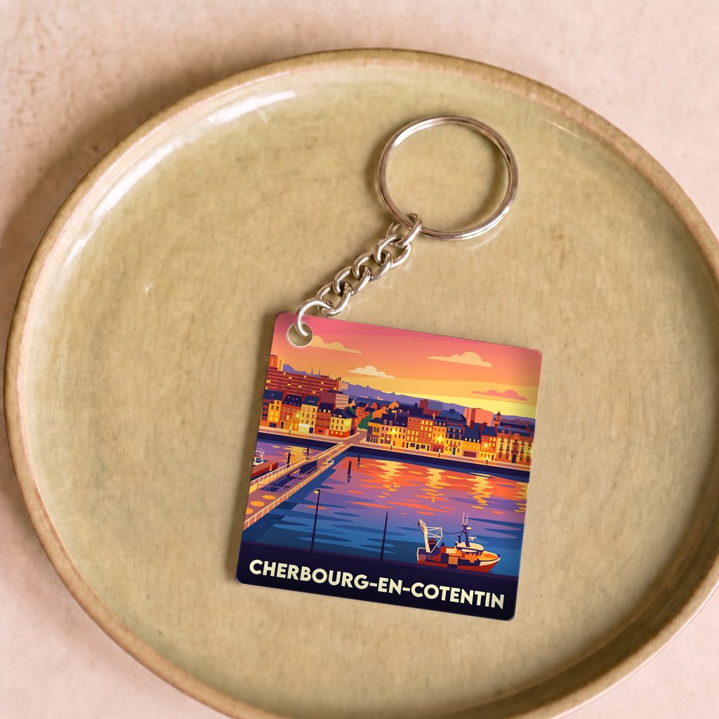 Porte-clés souvenir de la ville de Cherbourg-en-Cotentin avec une illustration stylisée du port.