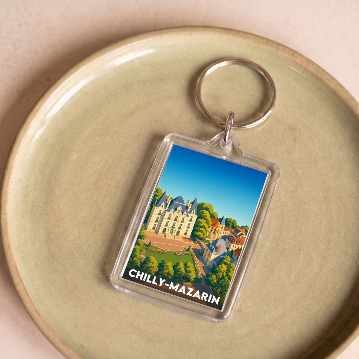 Porte-clés souvenir de la ville de Chilly-Mazarin avec une illustration stylisée.