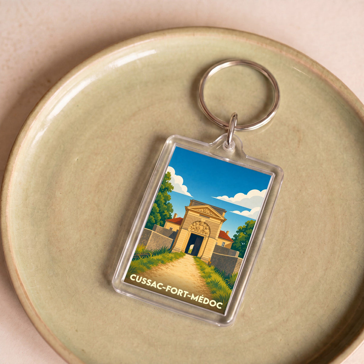 Porte-clés souvenir de Cussac-Fort-Médoc avec une illustration stylisée du fort.