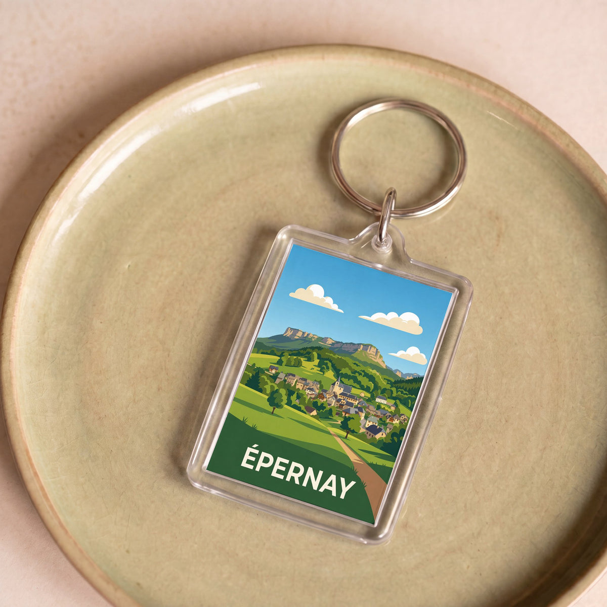 Porte-clés souvenir de la ville d'Épernay avec une illustration stylisée.
