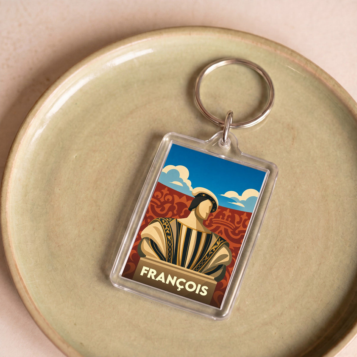 Porte-clés souvenir de la ville de François avec une illustration stylisée d'un personnage historique.