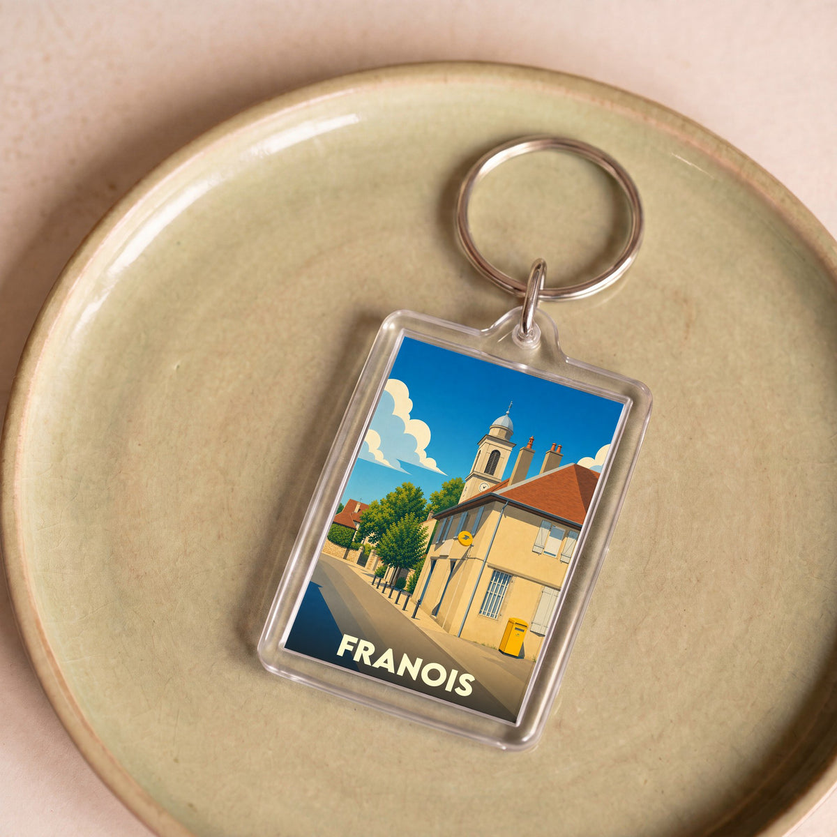 Porte-clés souvenir de la ville de Franois avec une illustration stylisée.
