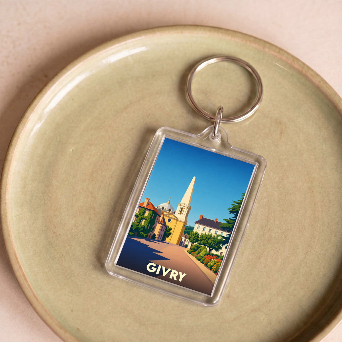 Porte-clés souvenir de la ville de Givry avec une illustration stylisée.