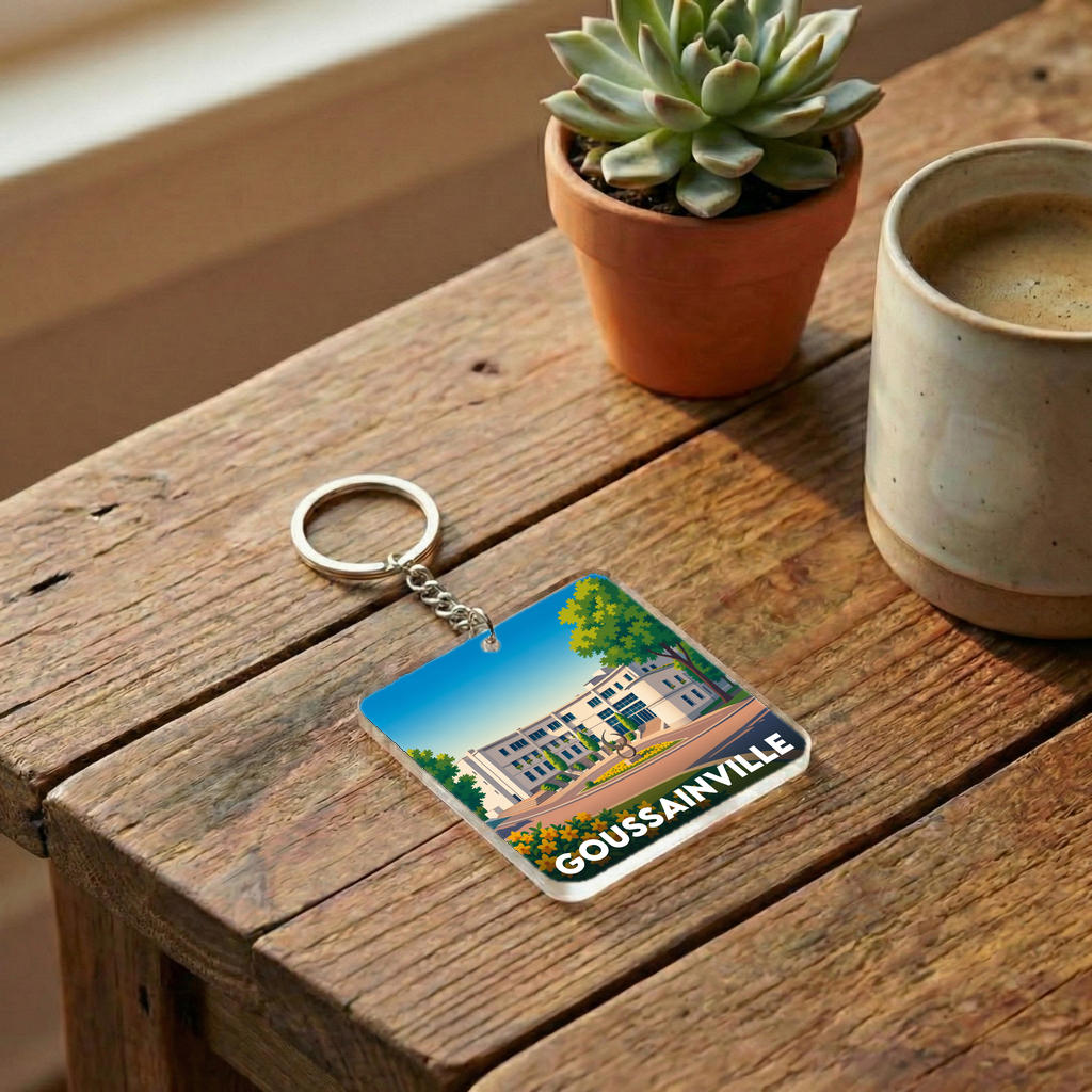 Porte-clés souvenir de la ville de Goussainville avec une illustration stylisée.