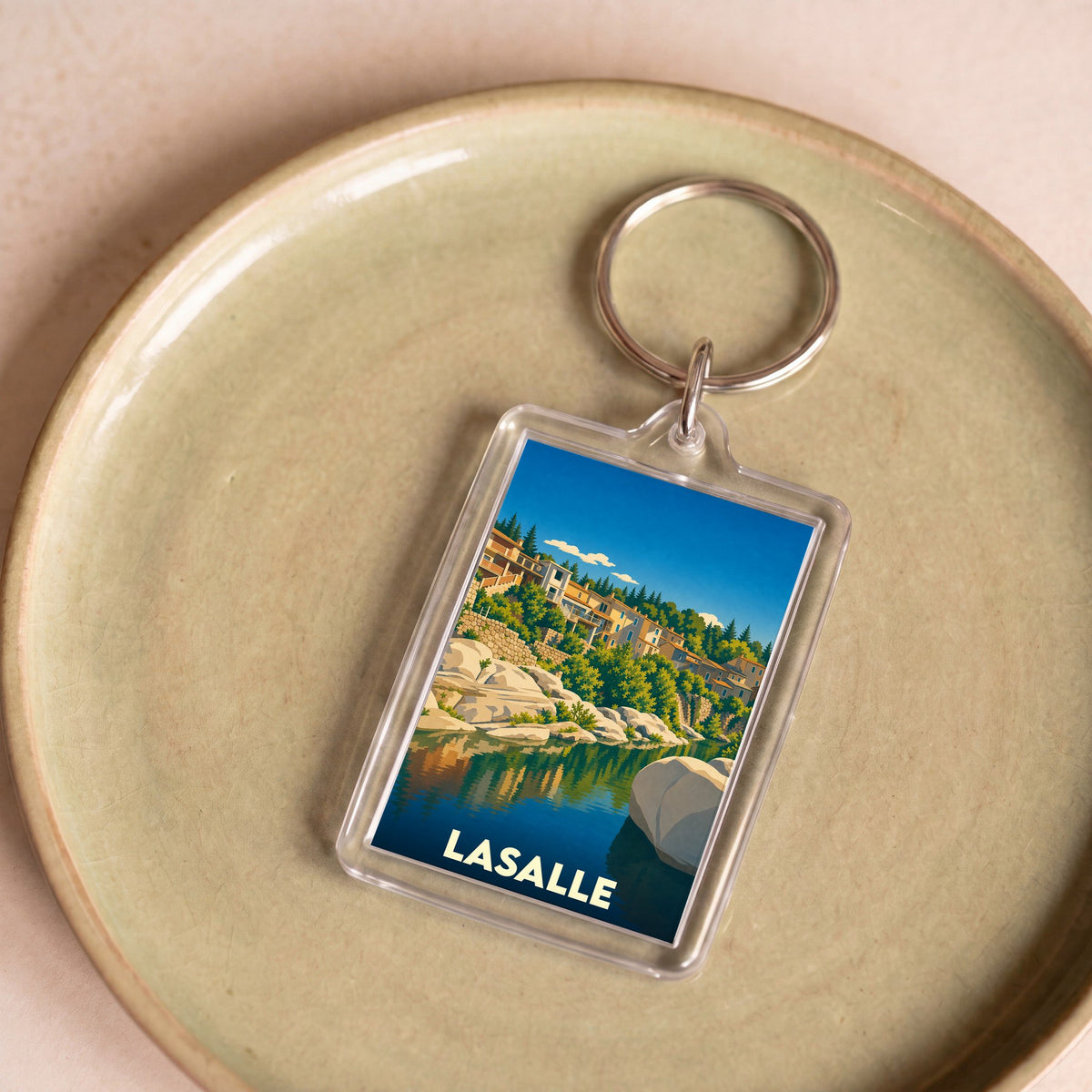 Porte-clés souvenir de la ville de Lasalle avec une illustration stylisée.