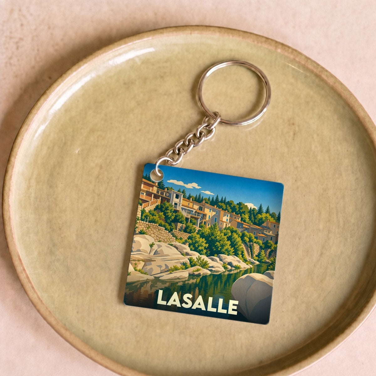 Porte-clés souvenir de la ville de Lasalle avec une illustration stylisée.