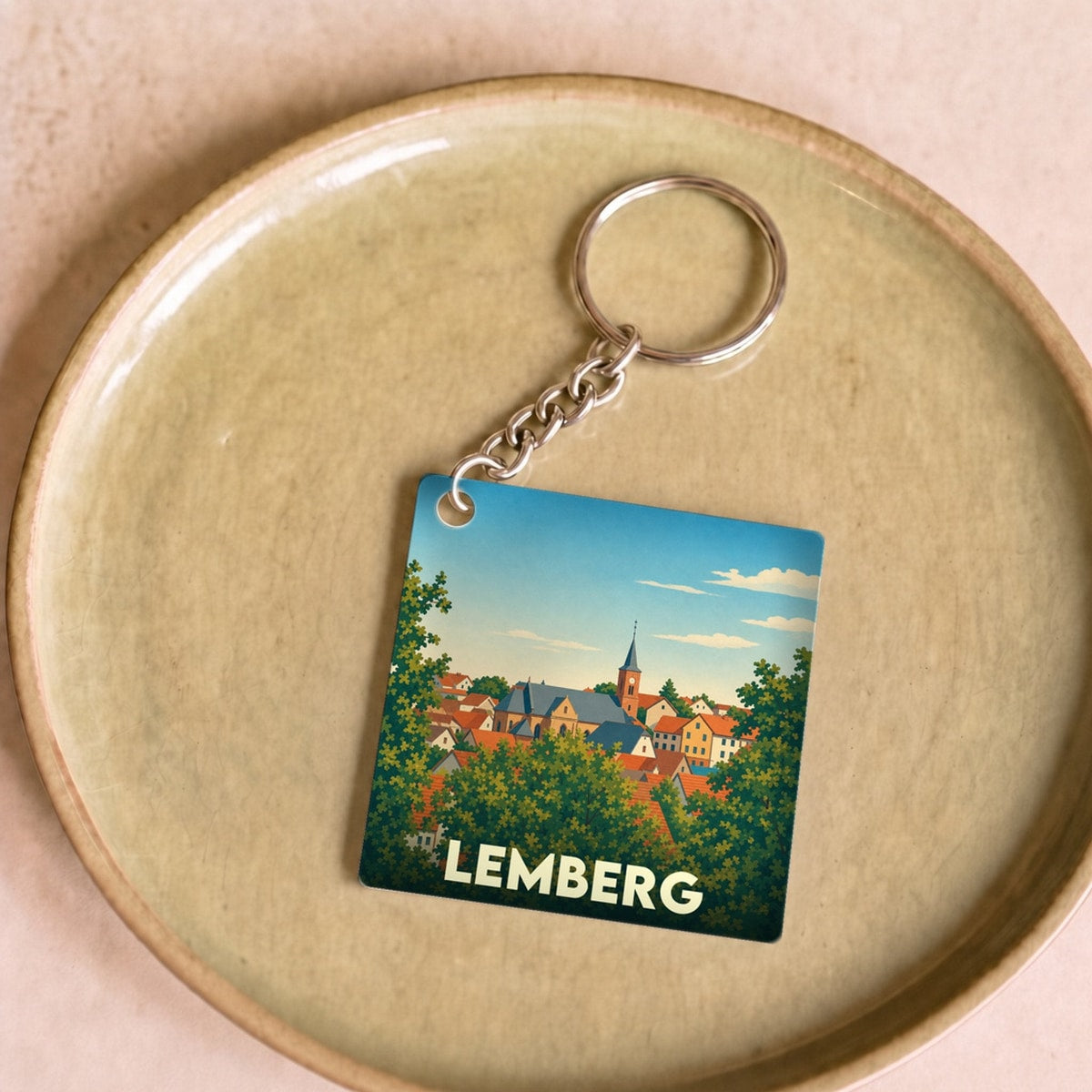 Porte-clés souvenir de la ville de Lemberg avec une illustration stylisée.