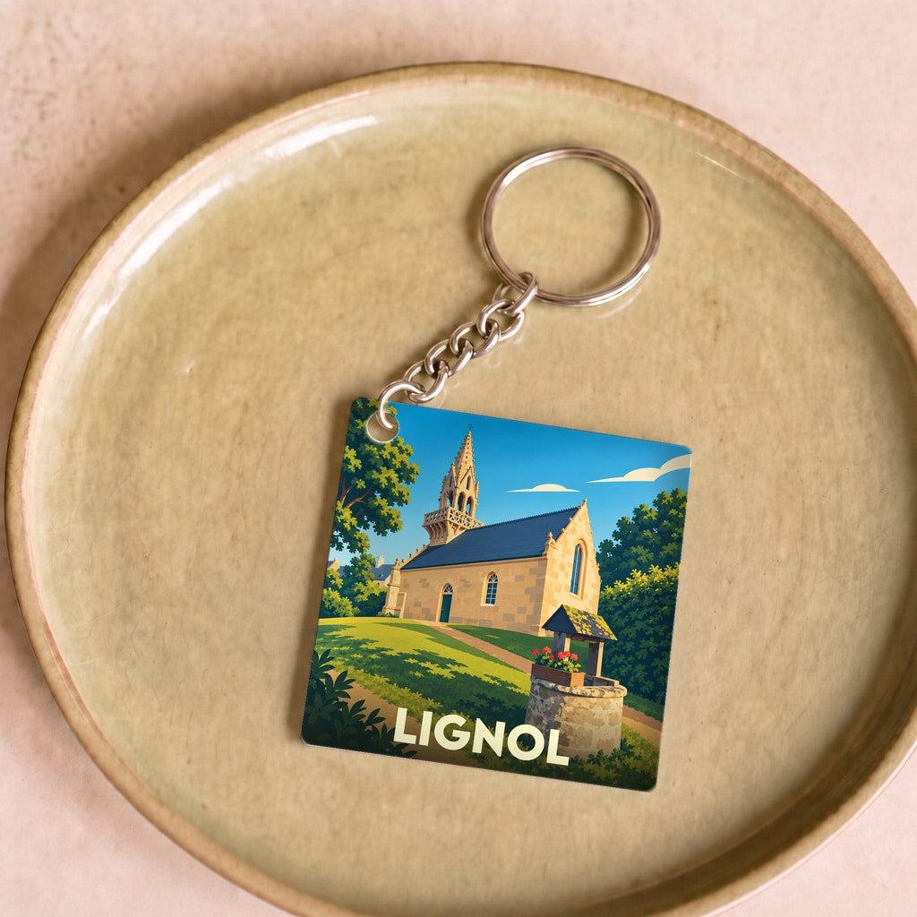 Porte-clés souvenir de la ville de Lignol avec une illustration stylisée de son église.