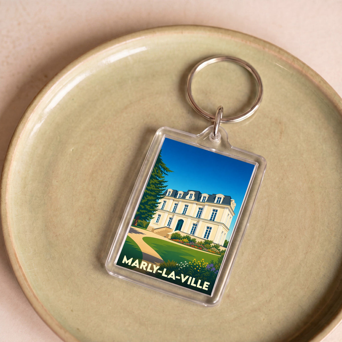 Porte-clés souvenir de Marly-la-Ville avec une illustration stylisée de l'hôtel de ville.