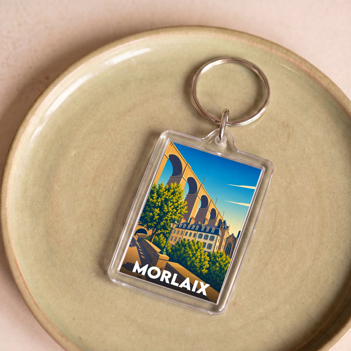 Porte-clés souvenir de la ville de Morlaix avec une illustration stylisée.