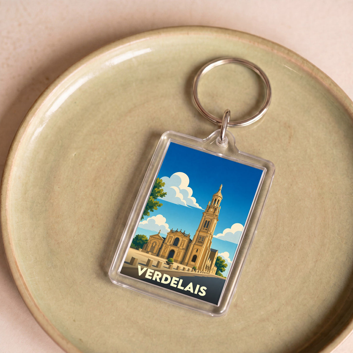 Porte-clés souvenir de la ville de Verdelais avec une illustration stylisée de sa basilique.