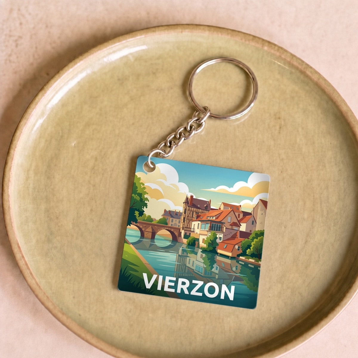 Porte-clés souvenir de la ville de Vierzon avec une illustration stylisée.